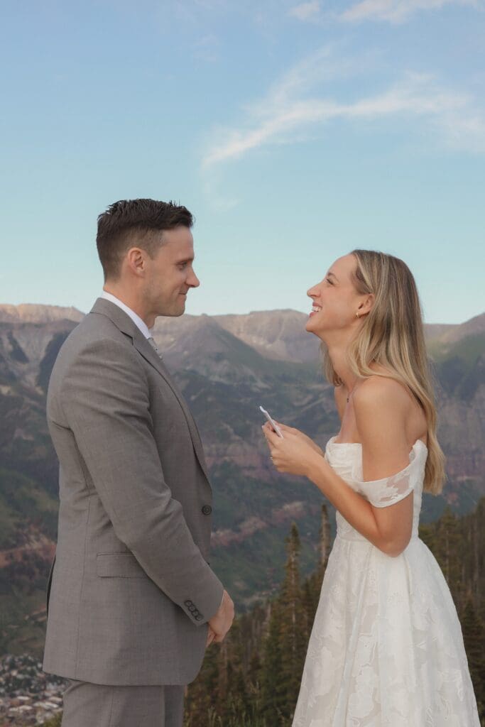 couple exchanging vows on top of sapphire point overlook