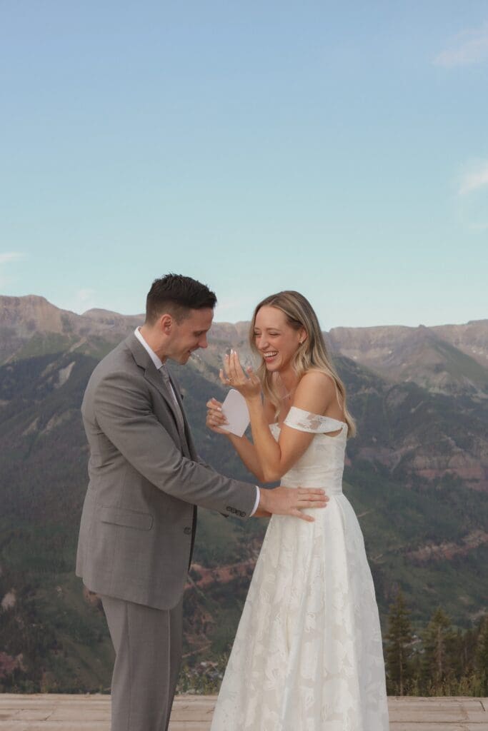 couple exchanging vows on top of sapphire point overlook