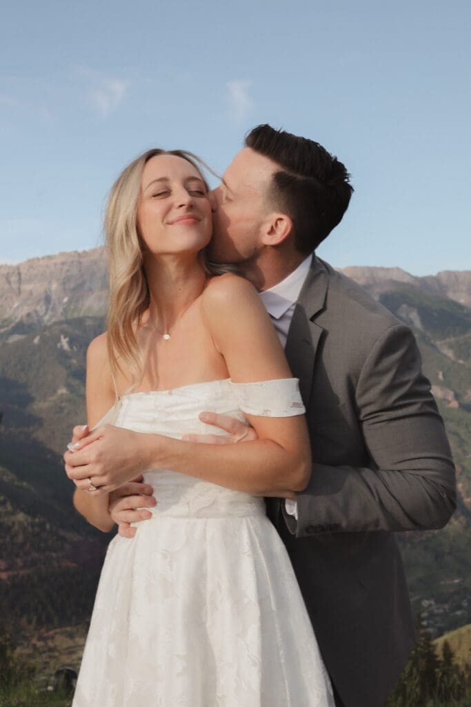 couple exchanging vows on top of sapphire point overlook